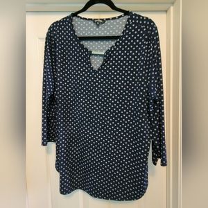 Navy blue with pink and white print blouse with 3/4 length sleeves and cutout